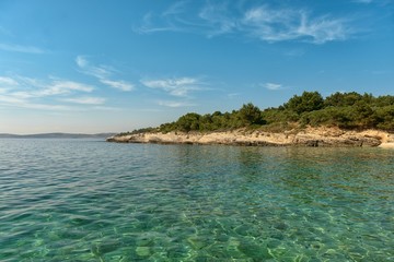 Coastline with horizon and sky