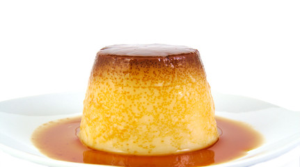 Creme caramel, custard or pudding isolated on white background