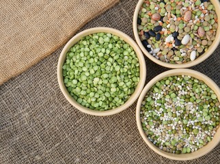 An assortment of legumes and cereals on a sackcloth