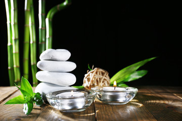Beautiful composition with spa stones and candles
