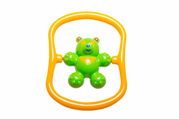 A colorful baby rattle on a white  background