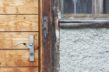 Old wooden door with lock