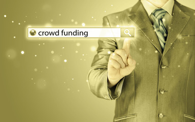 Businessman and crowd funding in search bar