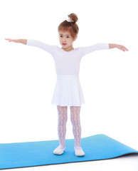 Elegant little girl gymnast.