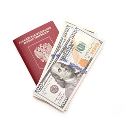 Fototapeta na wymiar Russian passport with American dollars
