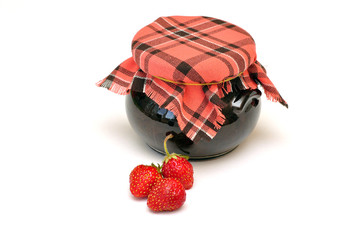 jar of jam tied with a checkered headscarf