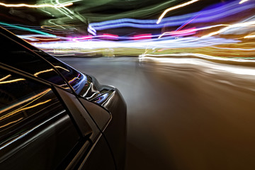 Colorful neon lights and car on the street