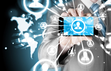 Business Hand holding a phone show the social network