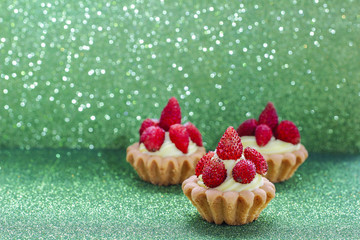 Beautiful tiny cupcakes with wild strawberries