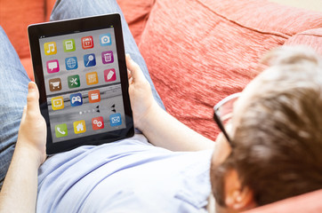 man with locked tablet