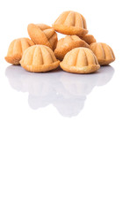 Kuih bahulu, Malay sweet egg sponge muffin cake on white 