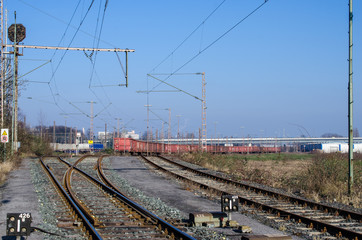 Fototapeta premium Railway tracks with freight train