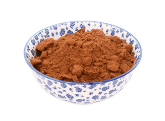 Cocoa powder in a blue and white china bowl