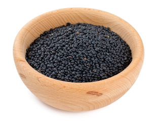 black lentils in a bowl isolated on white