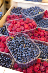 raspberries and blueberries, market in Nyons, Rhone-Alpes, Franc