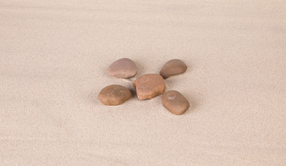 Fototapeta na wymiar Rocks on the sand.