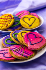 Obraz na płótnie Canvas Mardi Gras cookies with icing and decorations