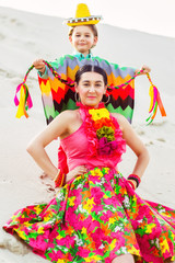 happy boy and his mother wearing Mexicans