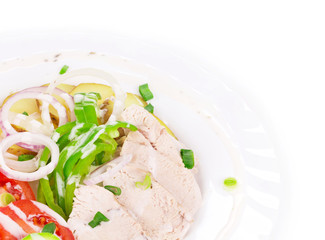 Warm meat salad with vegetables