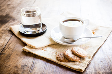Cup of coffee and biscuit