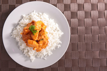 plate of rice and chicken