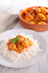 plate of rice and chicken