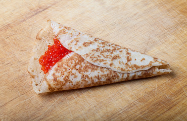 Russian pancakes - blini with red caviar