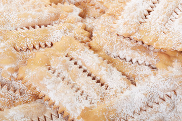 Chiacchiere, italian Carnival pastry background