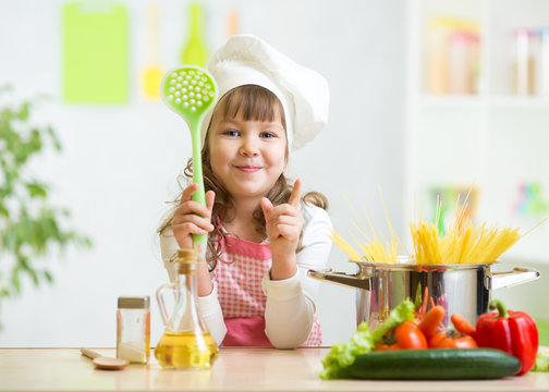 Kid Cook Makes Healthy Vegetables Meal In The Kitchen