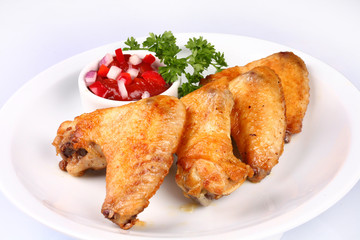 Chicken wings and vegetables