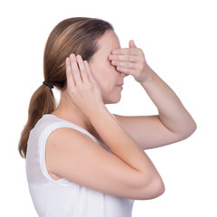 young woman  one hand over ear and other over her eye