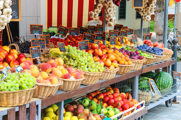 Fruit stall in the Italian city market - Powered by Adobe