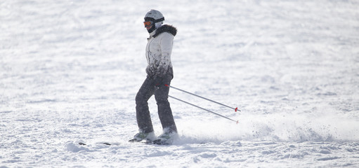 Fototapeta na wymiar woman on the slope.Skiing.