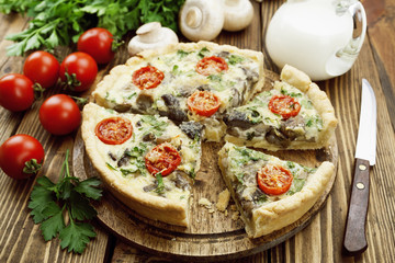 Kish with mushrooms and cherry tomatoes