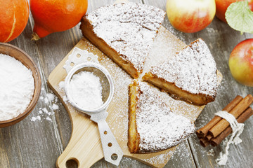 Pumpkin pie with apples and cinnamon