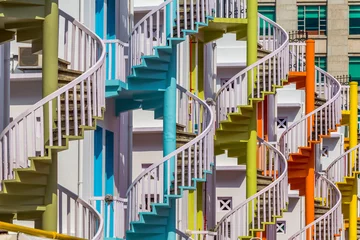 Gordijnen Colorful spiral stairs © SANCHAI