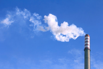 Smoke clouds from a high chimney