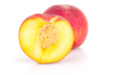 cut peaches on a white background