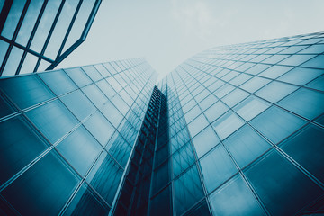 Blue skyscraper facade.  office buildings. modern glass silhouet