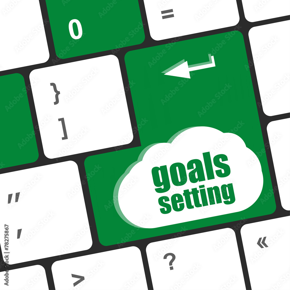Poster goals setting button on keyboard with soft focus
