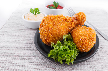 Fried chicken drumsticks with dips