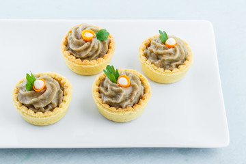 Salty mini tartlets stuffed with baba ganoush