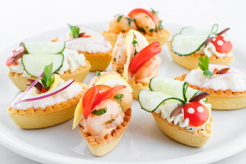 Assortment of mini tartlets, vegetable, shrimps, cream cheese