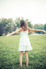 beautiful young woman with white dress