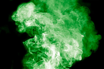 green smoke on a black background