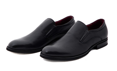 Black patent leather men shoes against white background. Male
