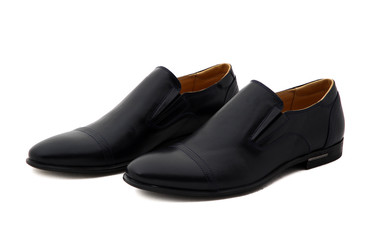 Black patent leather men shoes against white background. Male