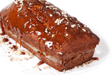Honey cake with banana cream, caramel decor