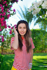 Fototapeta premium portrait of a young woman in the summer on a background of beaut