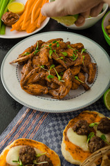 Sports feast - chicken wings, vegetable, french fries, pizza